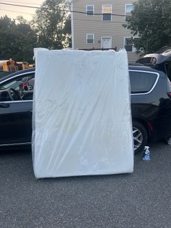 Queen memory foam mattress and split boxspring easy to move into basement or attic delivery fee curbside drop off