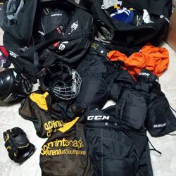 2 Bags Of Youth Hockey Pads Gloves Helmets Etc