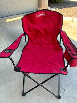 Coleman fold up chair with cupholder and cooler which will hold four cans.