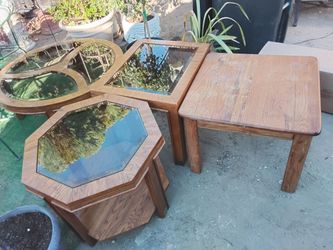 Set of four glass tables