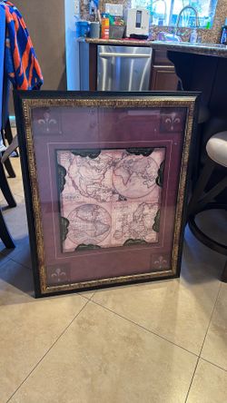 Painting in a glass/wooden frame