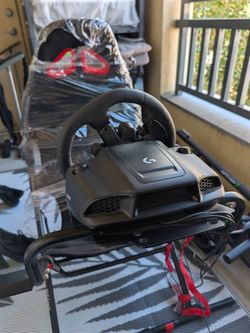 Logitech racing wheel & simulator Chair (Like new - with Box)