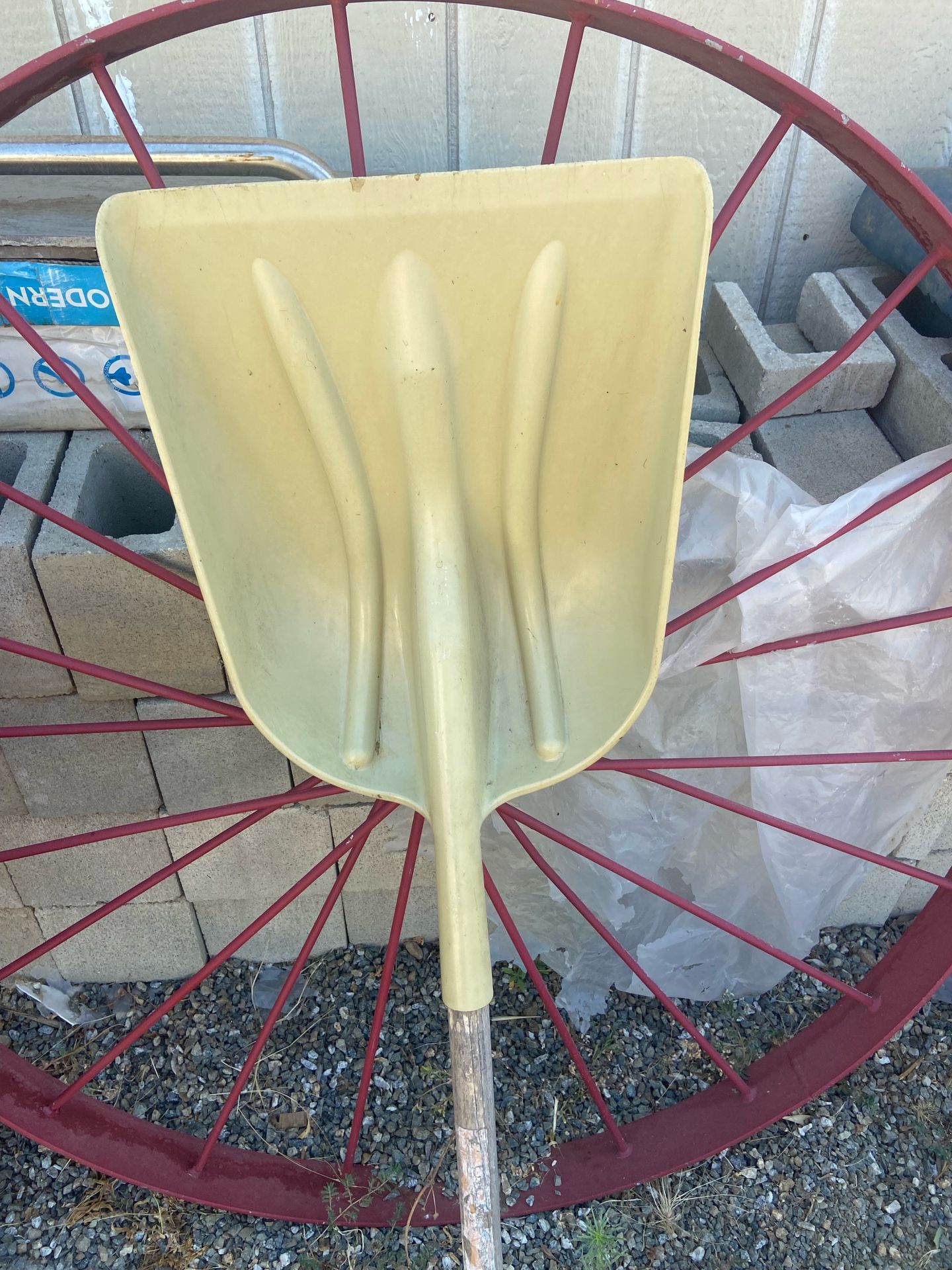 A poly scoop shovel, a grain scoop or general-purpose scoop.