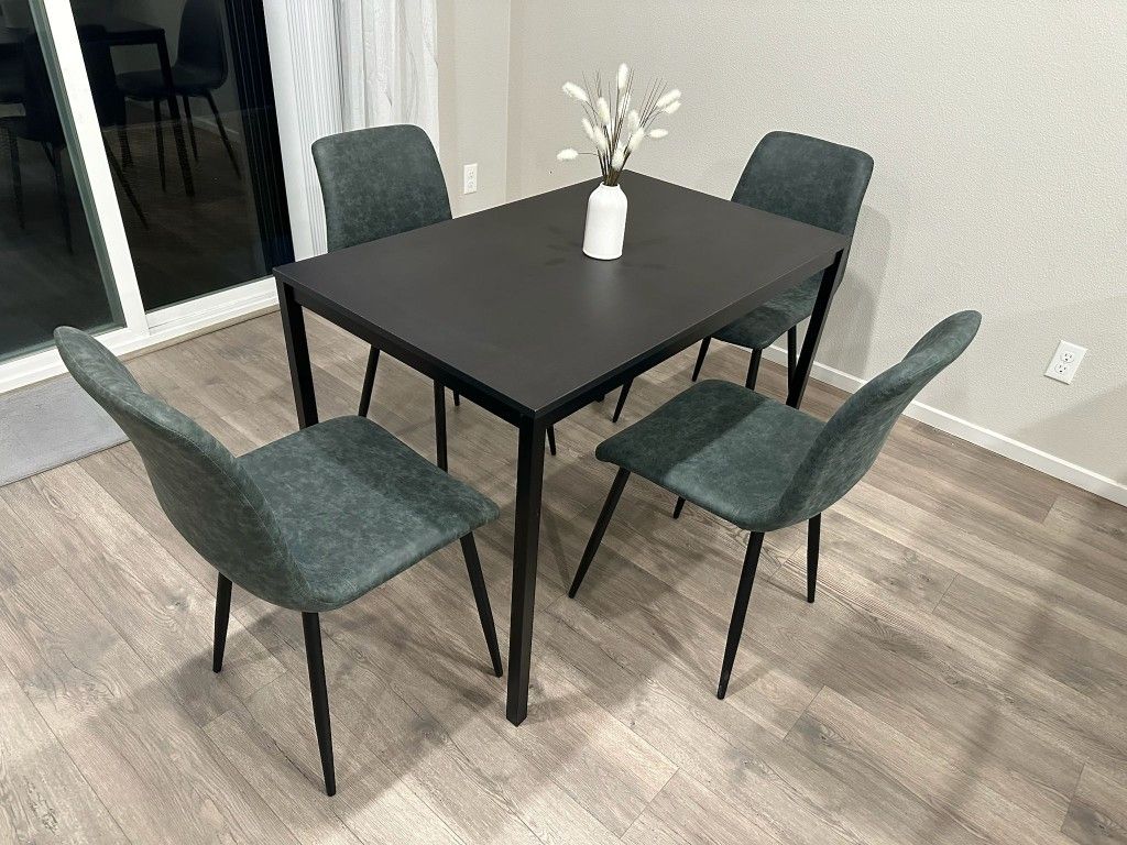 Black Table and 4 Green Faux Leather Chairs