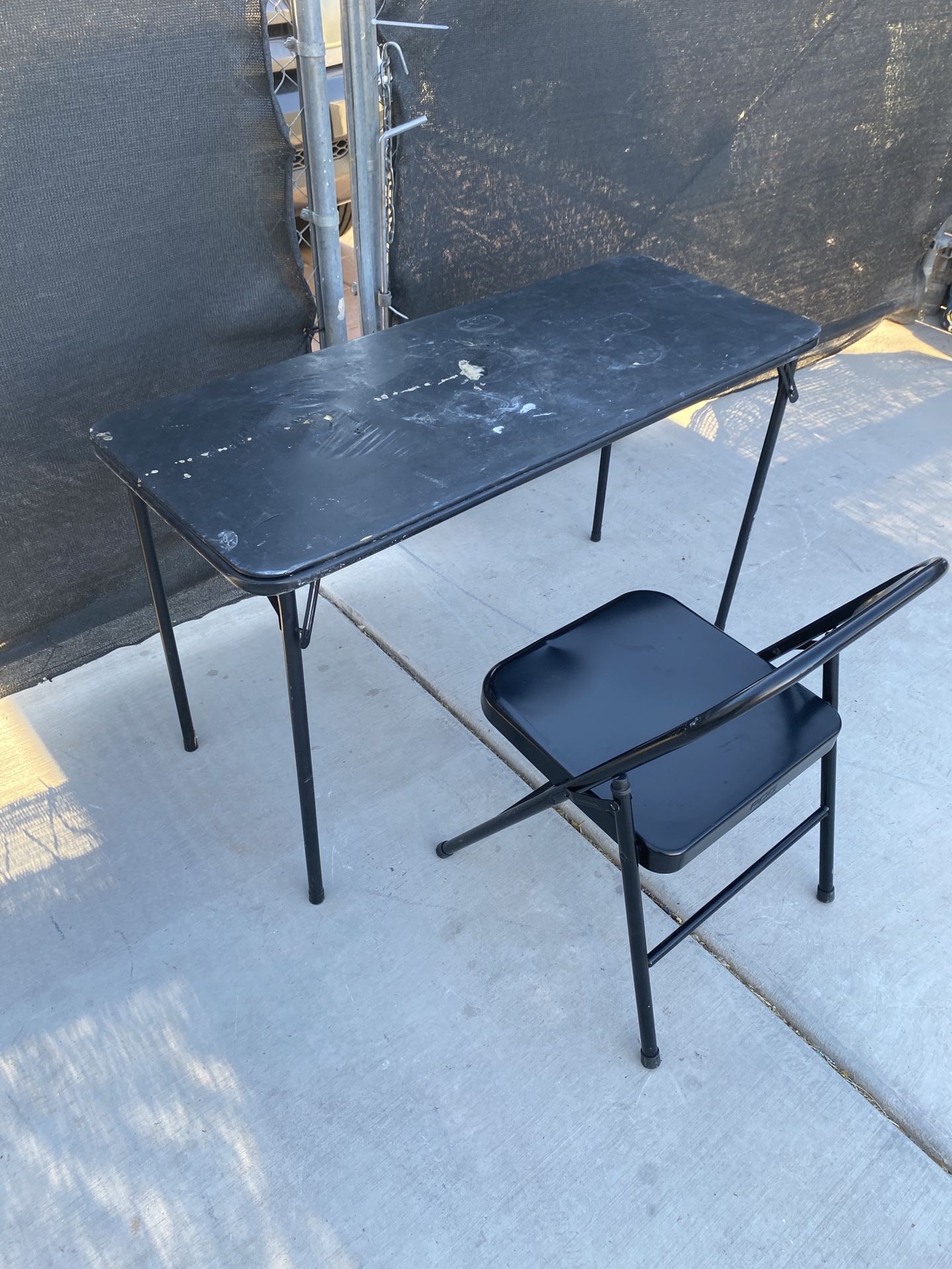 Folding table and metal chair