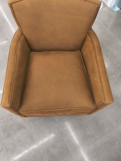 Rudy swivel leather chair New Arhaus