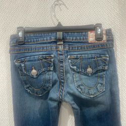 Deadstock & Archived True Religion blue and yellow low-rise bootcut jeans with a distressed finish  🥵🥵🤩🤩  Size 27   You won’t find these anywhere 