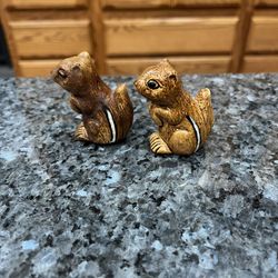 Vintage Brown Squirrel  Hand Painted Pair of Salt and Pepper Shakers.  Size approximately 2 inches tall.  Preowned missing stoppers.  