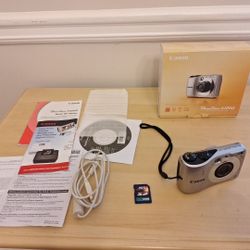 Canon Powershot A1200 12.1 Mp Camera . Box And Paper Work 