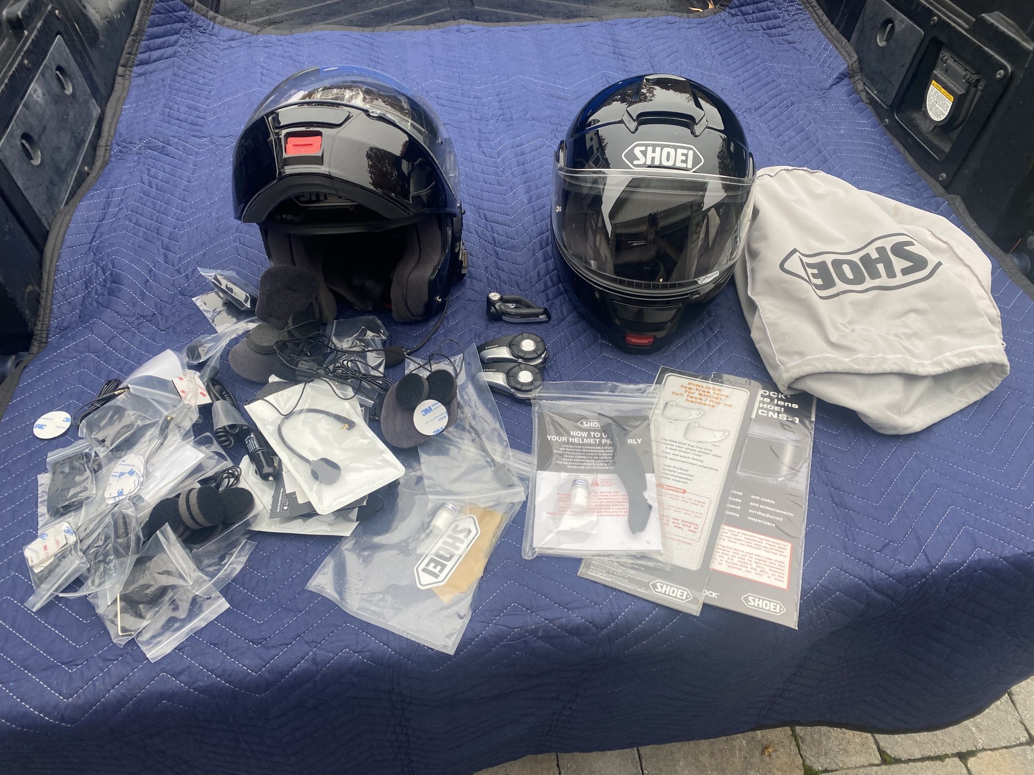 2 Small SHOE Neotec Helmets with SENA Comms and Remote