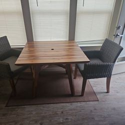 Wood Table And 2 Chairs .