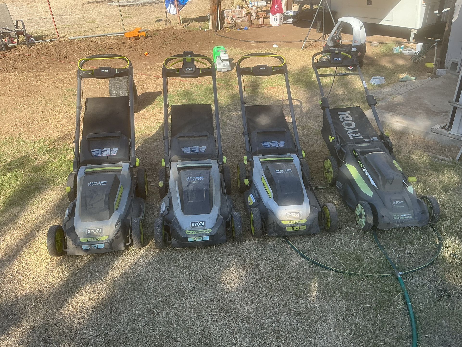 4 Ryobi Electric Mowers