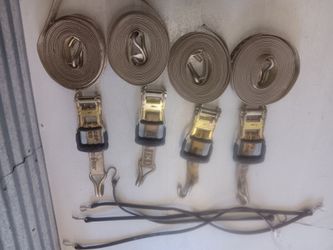Selling 4 33ft heavy duty straps and a come along with a wire stretcher