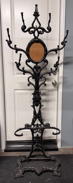 ANTIQUE CAST IRON HALL RACK