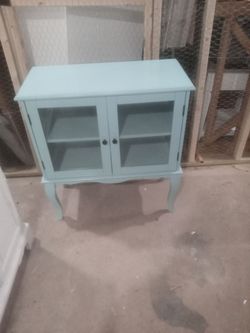 Beautiful. Little cabinet with glass front doors. Just got refurbished.