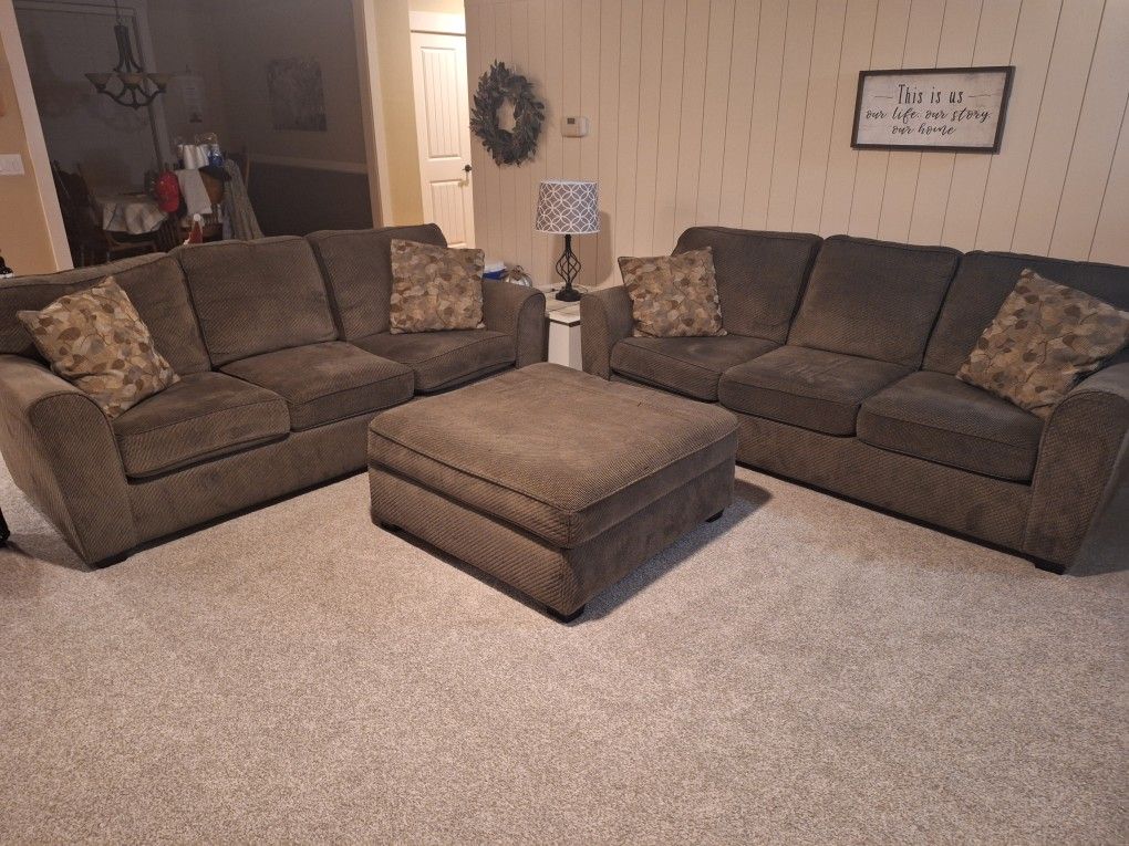 2 Couches With Ottoman and Pillows