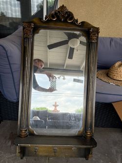 Antique mirror with shelf and key holders