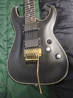 Schecter 6 String Diamond Platinum Series With Bat Inlay