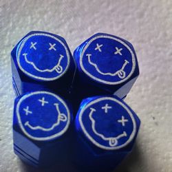:-) Tire valve stem caps four pack