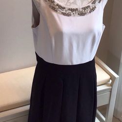 Elegant Cream and black dress with beautiful beading at neck! Perfect for a wedding, Bar Mitzvah or any formal occasion. 