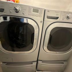 Lg Washer and Dryer set with pedestal storage drawer