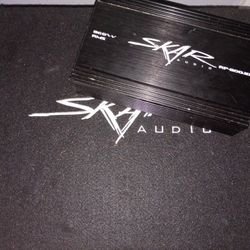 12" SINGLE SKAR AUDIO SUBWOOFER AND AMP IN ENCLOSURE 