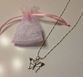 Butterfly necklace, silver tone 18" chain, comes in tiny pink lace gift bag