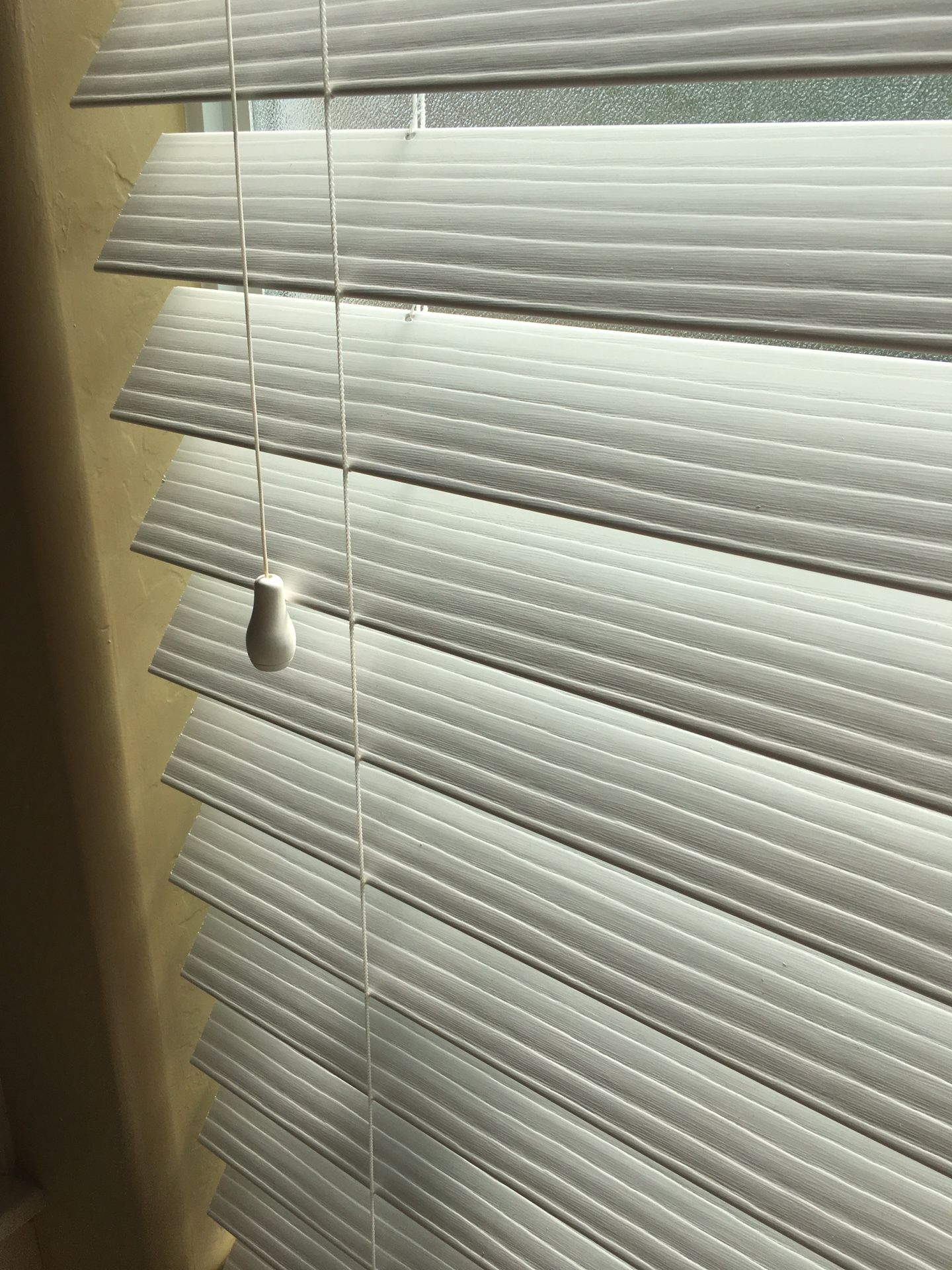 White window blinds: 1 at 22” wide X 59” Long