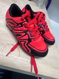 Red and Black Soccer Cleats