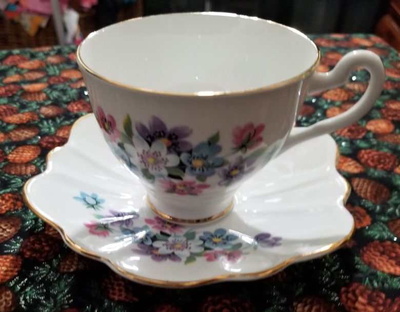 Delicate English Bone China Tea Cup and Saucer