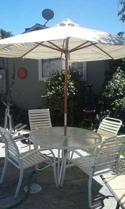 Serious buyers only need reply don't waste my time patio set Round Table 4 chairs and an umbrella $185