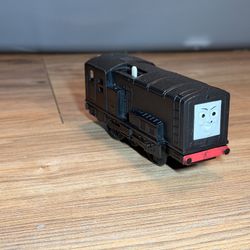 TrackMaster DIESEL Motorized Train Engine 2013 Mattel TESTED This black toy train engine is perfect for kids who love imaginative play. Its sleek desi