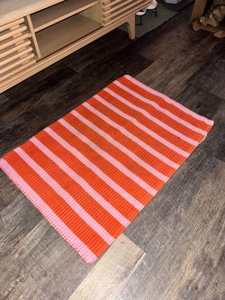 pink and orange kitchen mat