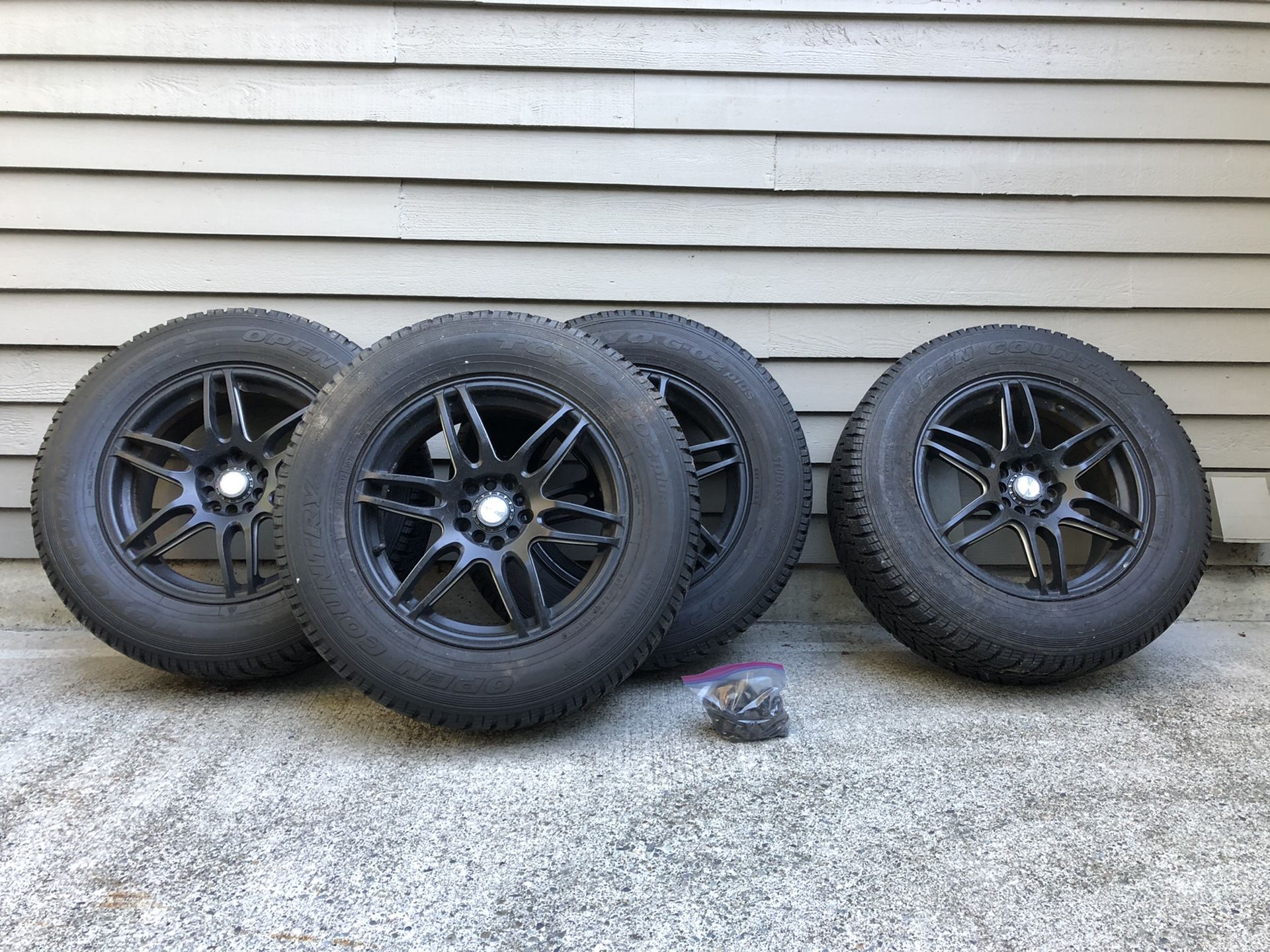Set of 4 - Rims and Studless Snow Tires (Toyo Open Country)