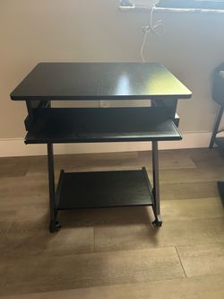 Pullout black desk for sale - Hammocks FL