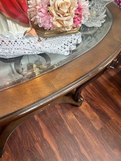 Solid wood and glass table.