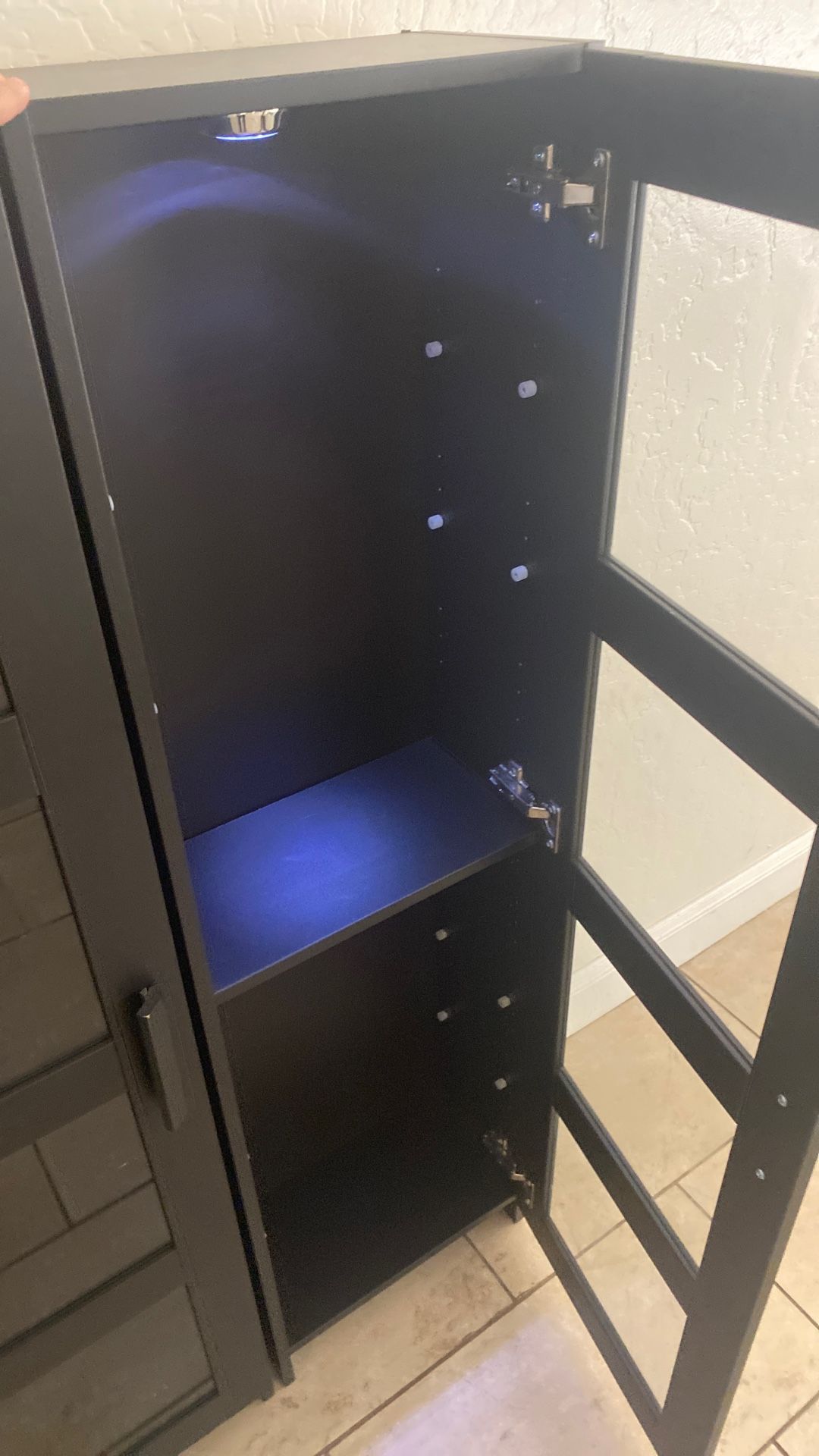 Black Cabinets With Lights And Glass Shelf’s