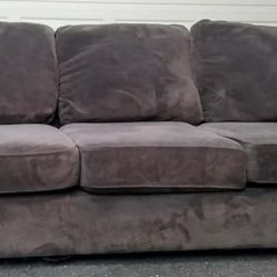 Grey plush sofa