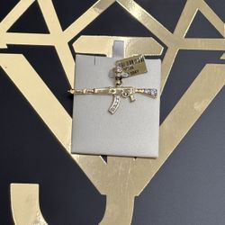 10k Gun Pendant 
