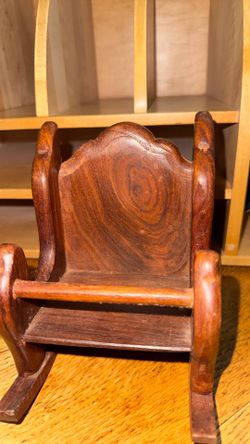 Solid Wood Carved Little Chair Rocker Valued At $75. I’m Selling It For 20 Solid Wood Section 6 Inches High 4 Inches Width.