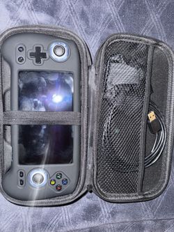 Anbernic Rg556 Moded ,With Games ,psp , Game Cube, Wii, Ps2 , With Carry Case And Cable To Charge.