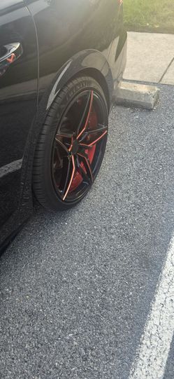 Black and Red Custom Aftermarket Wheel with Tire