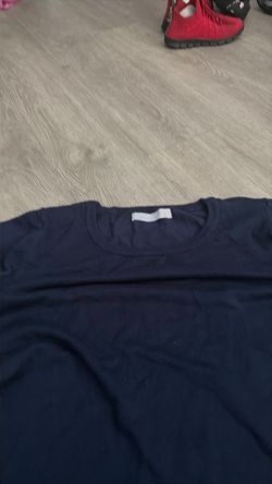 A female sweater it’s a size large
