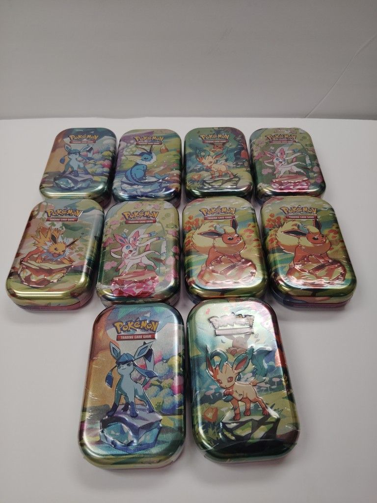 Prismatic Evolutions Tins