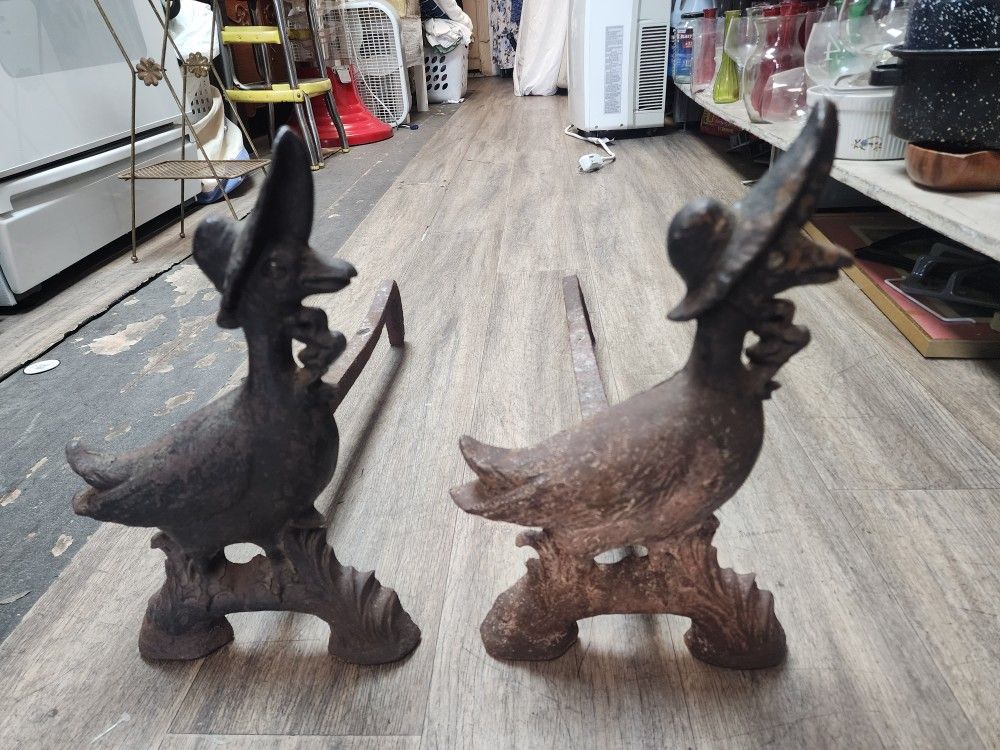 antique cast iron Mother Goose Andirons.