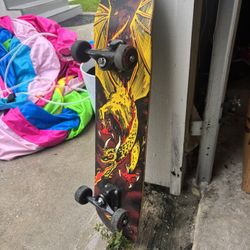 Golden Powell signature dragon skateboard