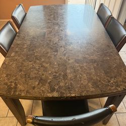 Dining table with 5 chairs in good condition
