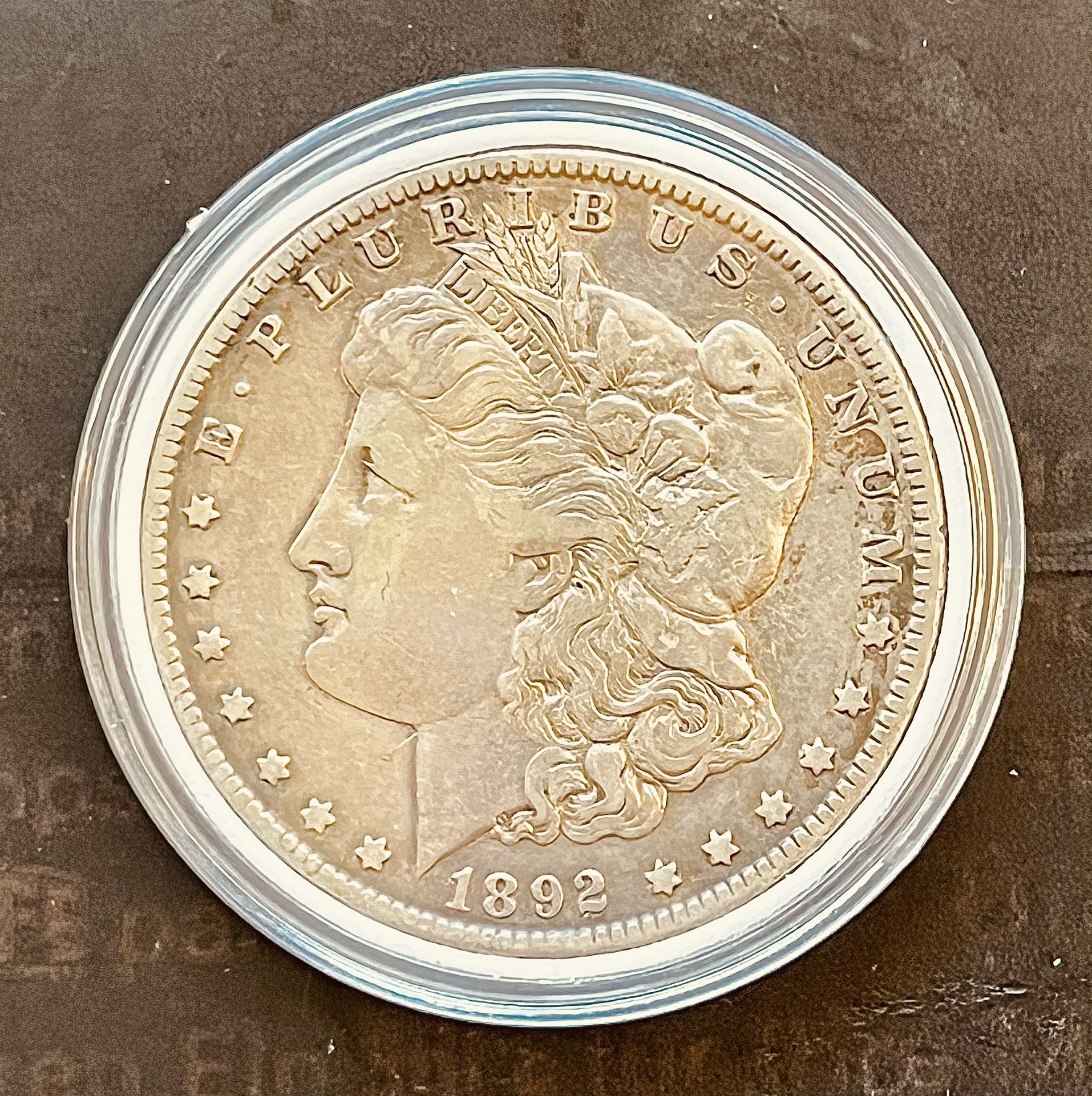 1892-O Morgan Silver Dollar In Plastic Case