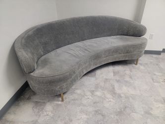 Curved Gray Velvet Sofa with Gold Legs