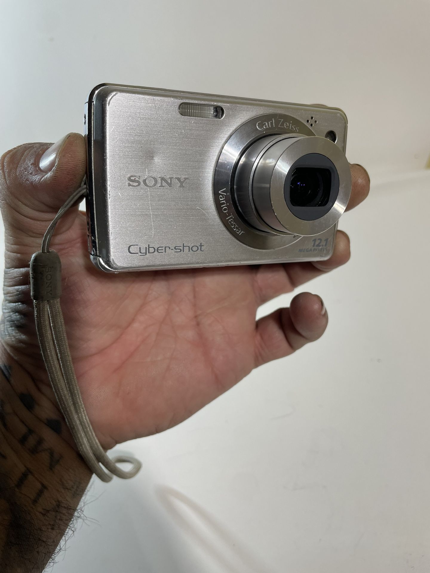 Sony Cyber-shot DSC-W220 Silver 12.1MP Compact Digital Camera with Battery